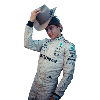Andrea Kimi Antonelli wearing a 2025 Formula 1 Mercedes USA Austin GP Mojave Desert inspired design racing suit with various sponsor logos - Kartx Gear