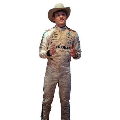 Andrea Kimi Antonelli wearing a 2025 Formula 1 Mercedes USA Austin GP Mojave Desert inspired design racing suit and cowboy hat, giving a thumbs-up gesture - Kartx Gear