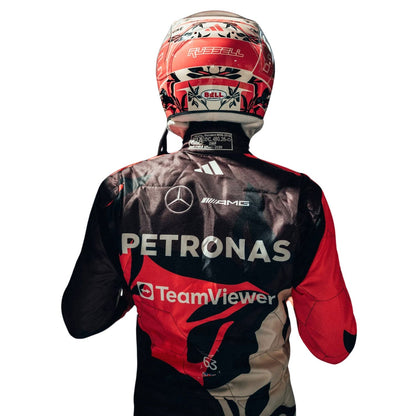 George Russell, wearing a colorful 2025 Miami GP Tropical Inspired design Mercedes F1 racing suit with helmet featuring Petronas, Mercedes-AMG, and TeamViewer logos - Kartx Gear