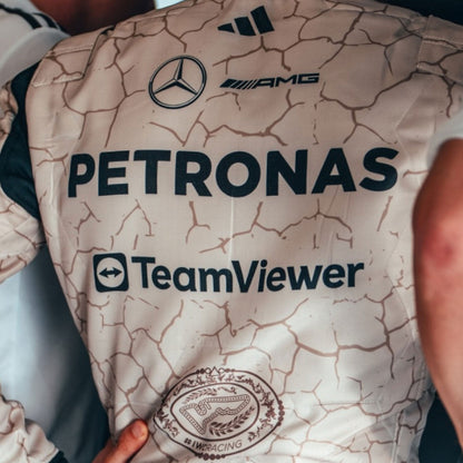 George Russell wearing a 2025 Formula 1 Mercedes USA Austin GP Mojave Desert inspired design racing suit  - Kartx Gear