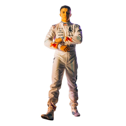 Isack Hadjar is wearing a white 2025 VCARB Las Vegas GP F1 racing suit with sponsor logos - Kartx Gear