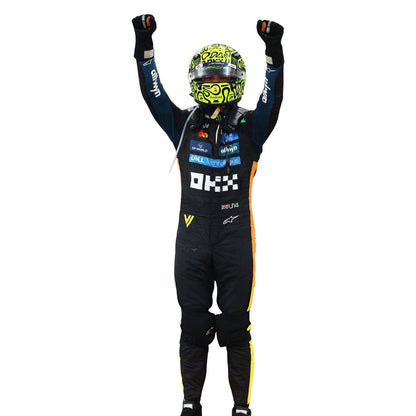 Lando Norris, Team F1 McLaren, Abu Dhabi GP, in a 2025 F1 racing suit and helmet with raised arms - Kartx Gear