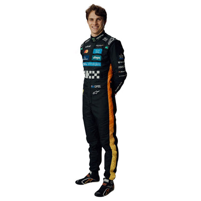 Oscar Piastri wearing a black 2025 McLaren Abu Dhabi GP F1 racing suit with various sponsor logos - Kartx Gear