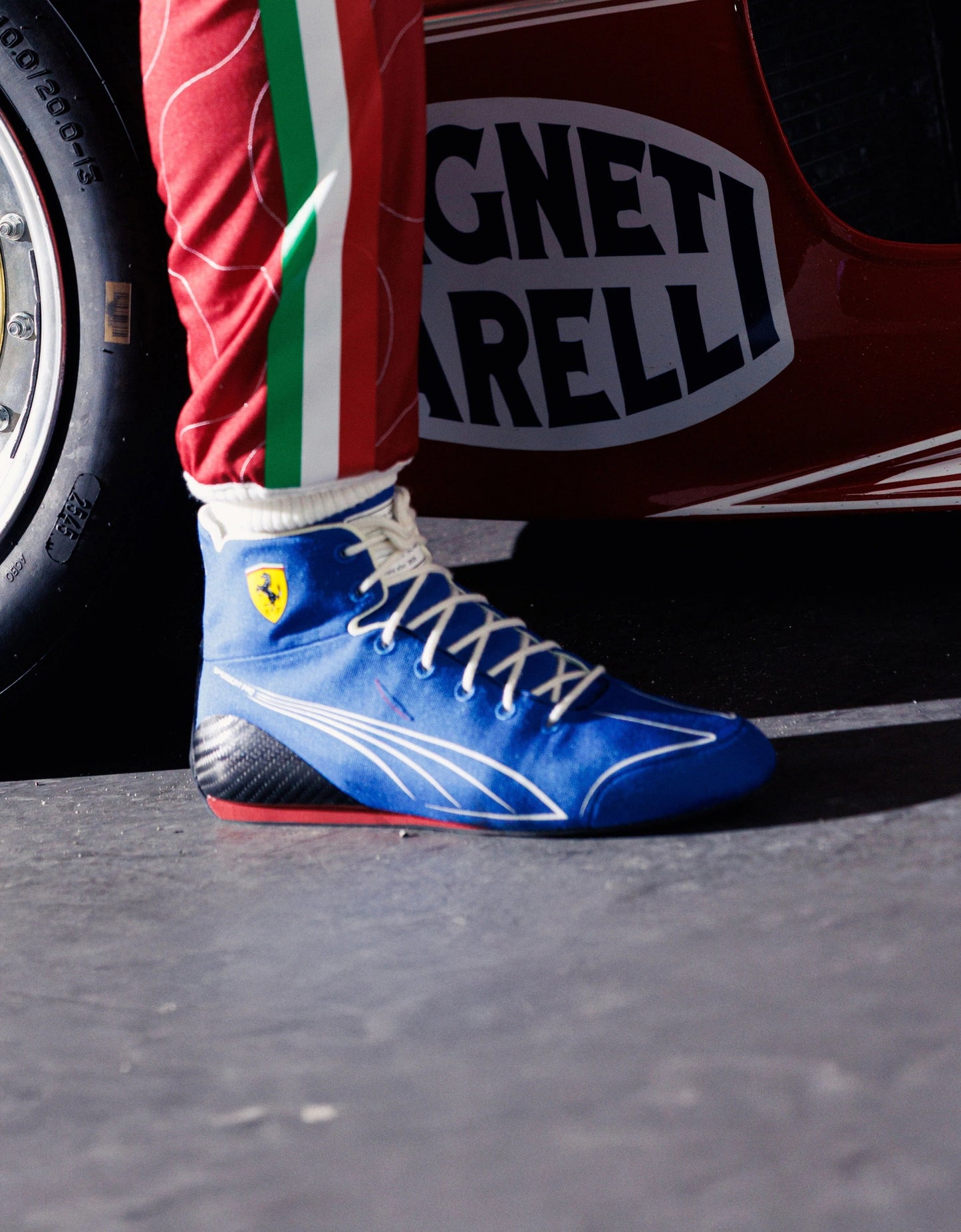 Blue 2025 Racing Team F1 Ferrari Monza GP Racing shoe with a Ferrari logo on a track, featuring a prominent 'Mugen' - Kartx Gear