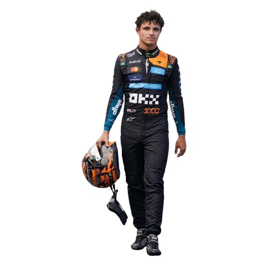 Front View of Lando Norris wearing a 2026 McLaren 1000 GP F1 racing suit in Monaco with various sponsor logos, holding a helmet - Kartx Gear