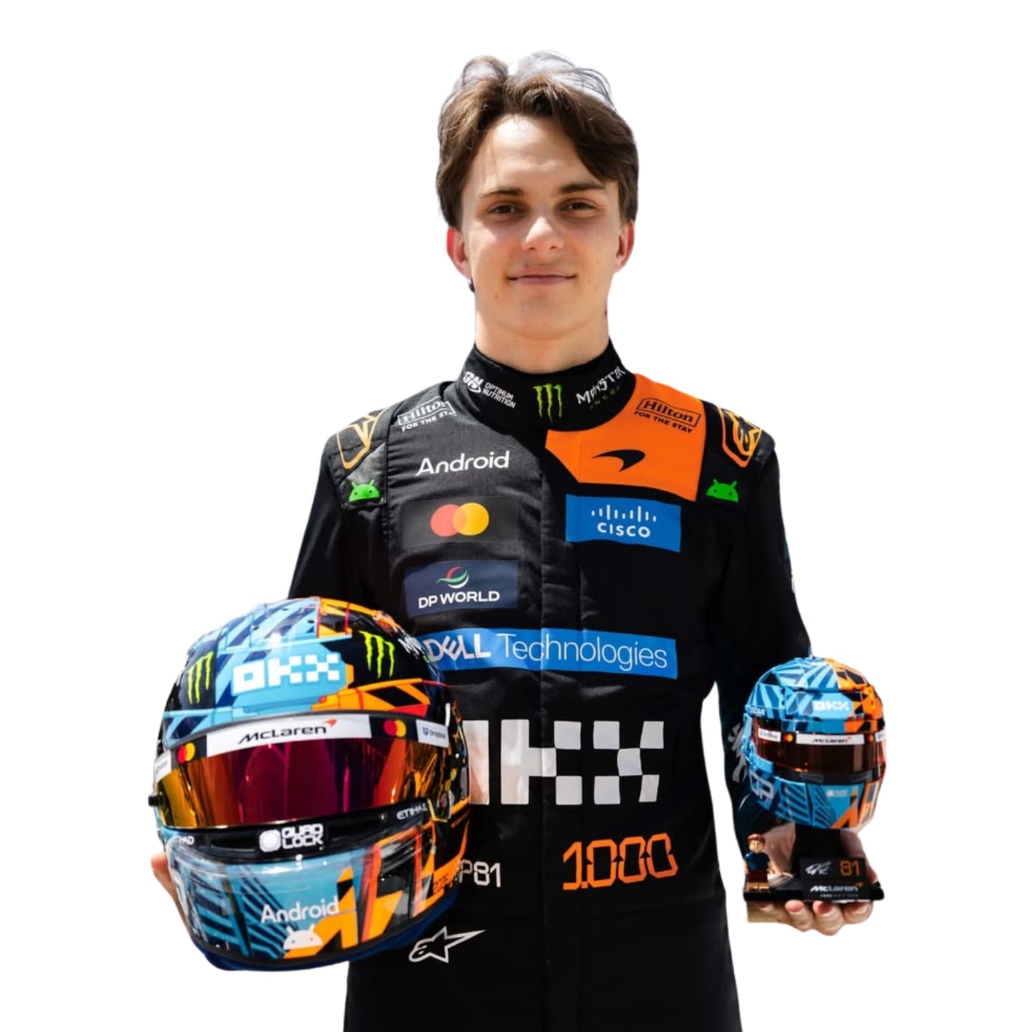 Close Up View of Oscar Piastri wearing a black 1000th Monaco GP 2026 McLaren F1 racing suit and Holding Helmets - Kartx Gear 
