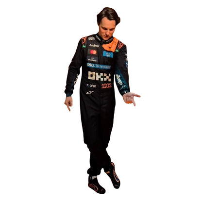 Front View of Oscar Piastri wearing a black 1000th Monaco GP 2026 McLaren F1 racing suit with various sponsor logos - Kartx Gear