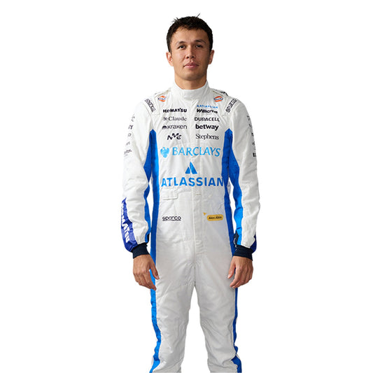 Alexander Albon wearing a white 2026 Williams F1 racing suit with blue accents and sponsor logos - Kartx Gear