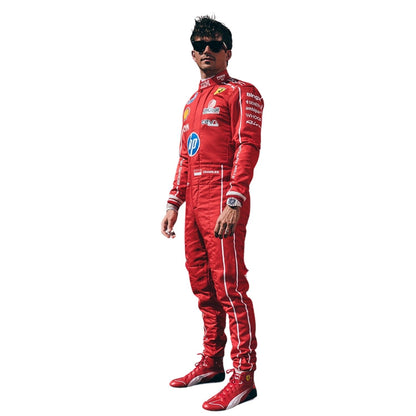 A Charles Leclerc wearing a red Ferrari racing suit with sponsor logos, posed against a solid white background.