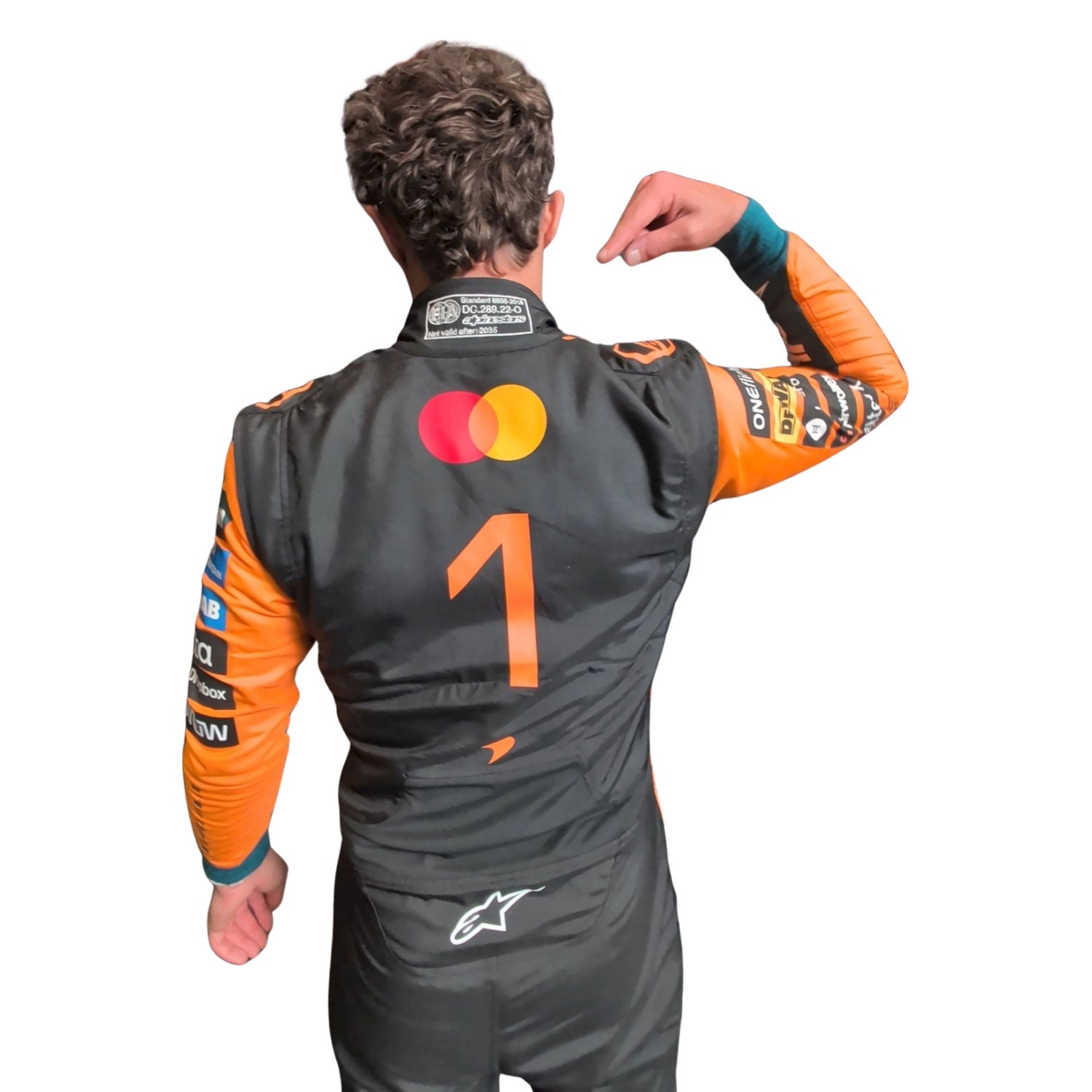 Lando Norris wearing a 2026 McLaren F1 racing suit with visible number '1' branding - Kartx Gear