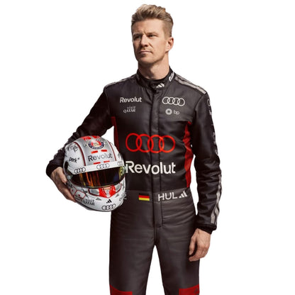 Nico Hulkenberg wearing a 2026 Audi F1 racing suit holding a helmet on a white background - Kartx Gear