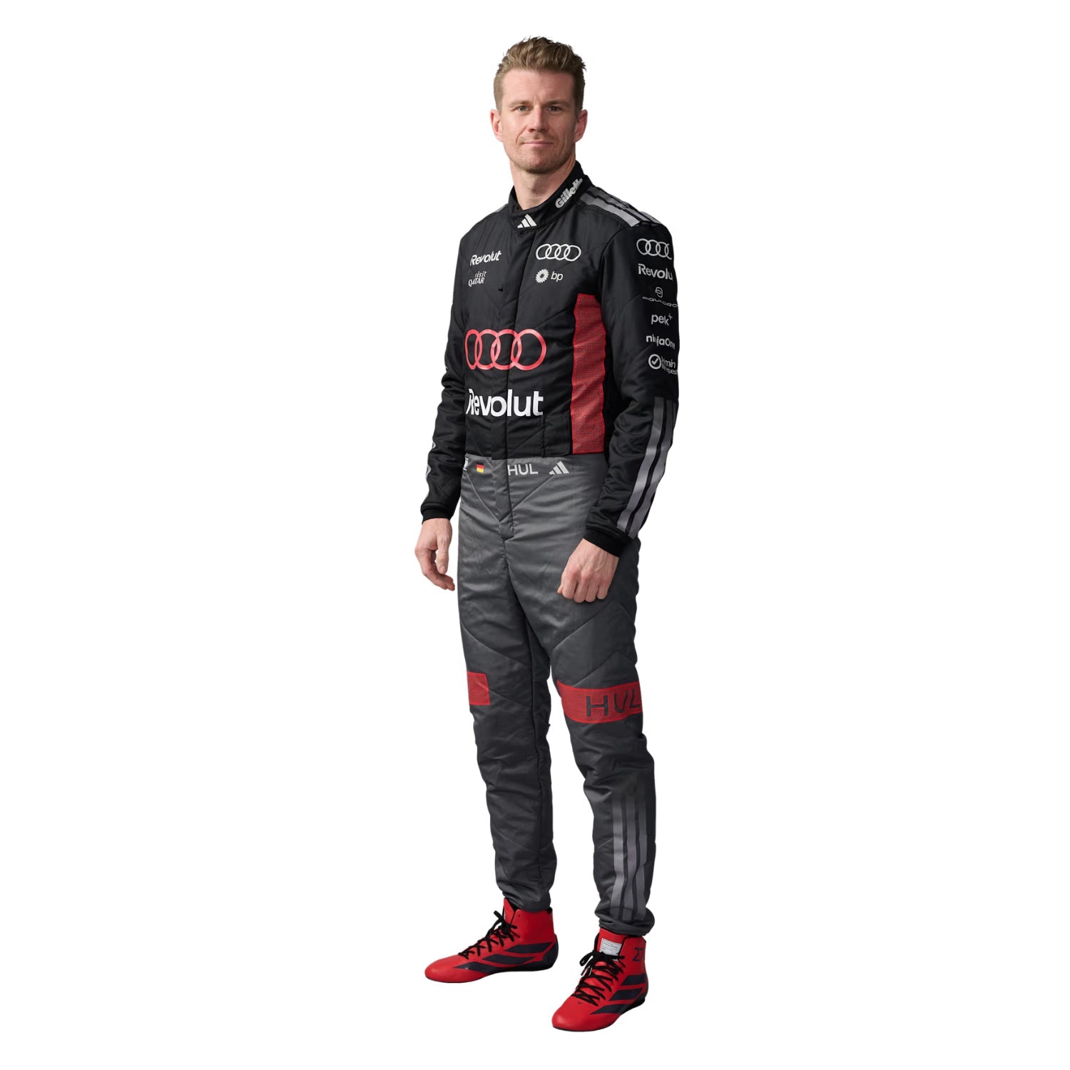 Nico Hulkenberg wearing an Audi 2026 F1 racing suit on a white background - Kartx Gear