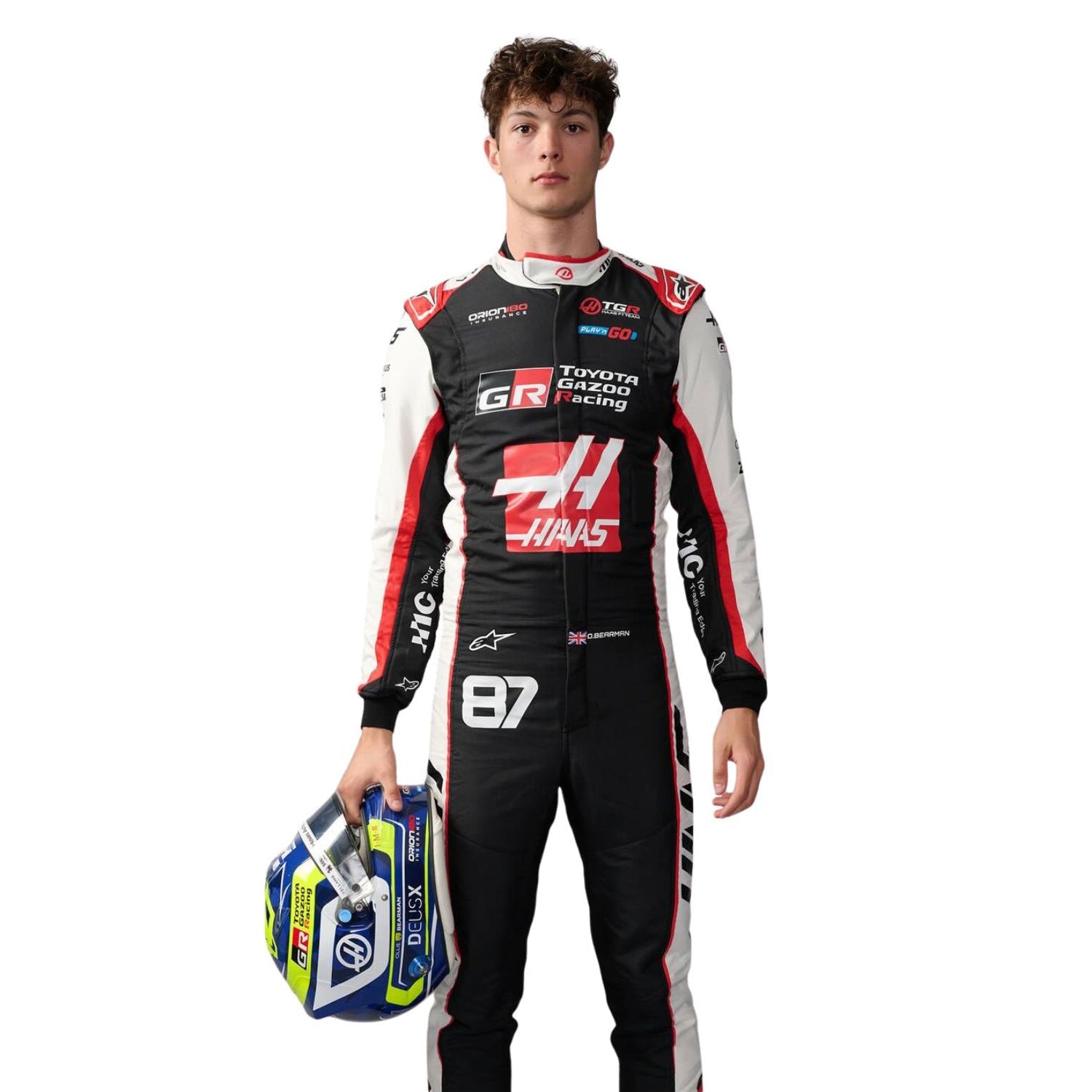 Oliver Bearman wearing a Haas F1 2026 racing suit with various sponsor logos - Kartx Gear