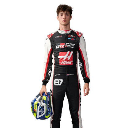 Oliver Bearman wearing a Haas F1 2026 racing suit with various sponsor logos - Kartx Gear