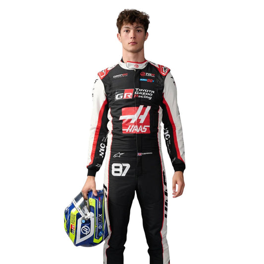 Oliver Bearman wearing a Haas F1 2026 racing suit with various sponsor logos - Kartx Gear