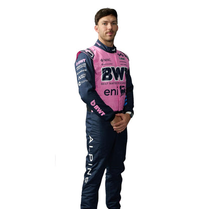 Pierre Gasly wearing a pink and black 2026 Alpine F1 racing suit with various sponsor logos on a white background - Kartx Gear